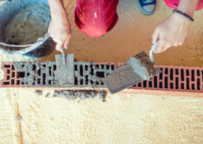 Mason worker building a wall