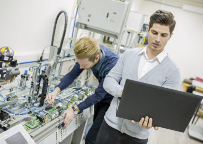 Engineer students in the factory