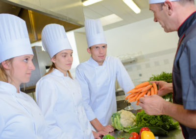 Chef teaching about vegetables.