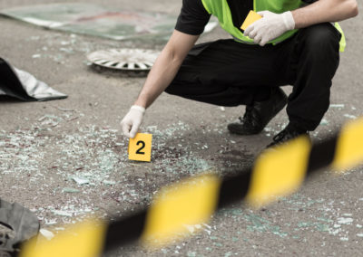 Policeman during investigation at road accident area