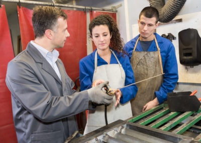 Metalwork students training in workshop